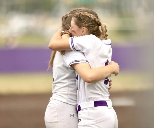 Madalana Bendix and Allyson Havercamp console each other after their season-ending loss to North Rockland.