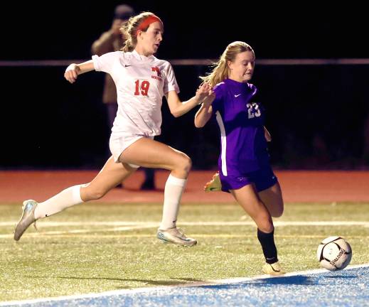 M-W’s Kyra Gilligan (#23) gets off a shot in the first half of play against North Rockland during the first round of the state soccer playoffs on Nov. 5.