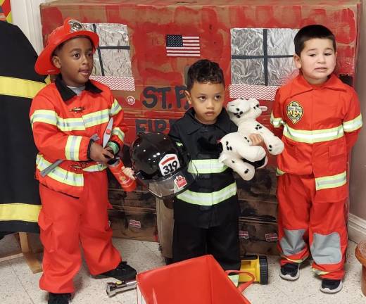 Firefighters Christan Reid, Carl Wongsotaroeno and Joshua Davila