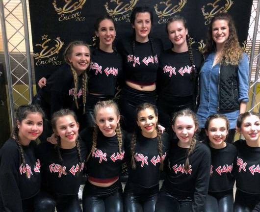 The Hip-Hop Company team danced to &quot;Bring Em Out.&quot; Back row: Allison Pekruar, left, Madison Travaglione, Grace Welsh, Abby Auty and instructor Jennifer Ferrantelli. Front row: Alexa Roman, left, Ava Tomford, Grace McCleary, Briana Caceres, Sophie Baer, Ella Katzman and Sydni Belnick. Yasmine Peralta and Nina Melone also are members of the company.