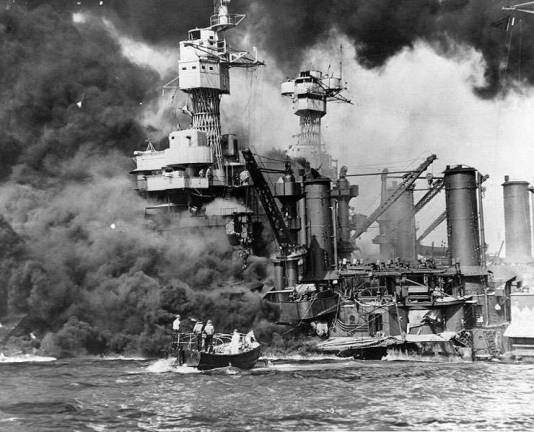 Source: National ArchivesRescuing survivors near the USS West Virginia after the attack on Pearl Harbor, December 7, 1941.