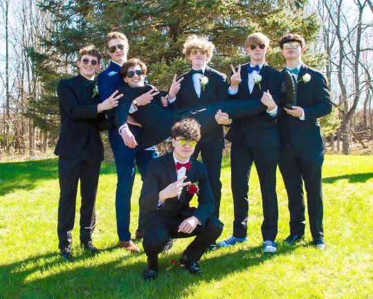 Future members of the Sit &amp; Chat Club posed on their way to the Junior Prom last year.
