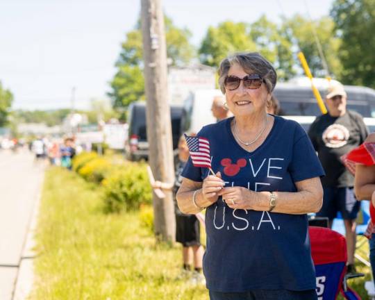 Local faces enjoy the parade.