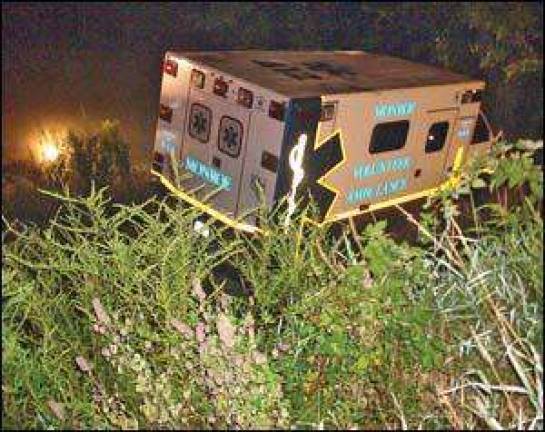 Officials: Ambulance Corps volunteer crashed rig when he went to get cigarettes