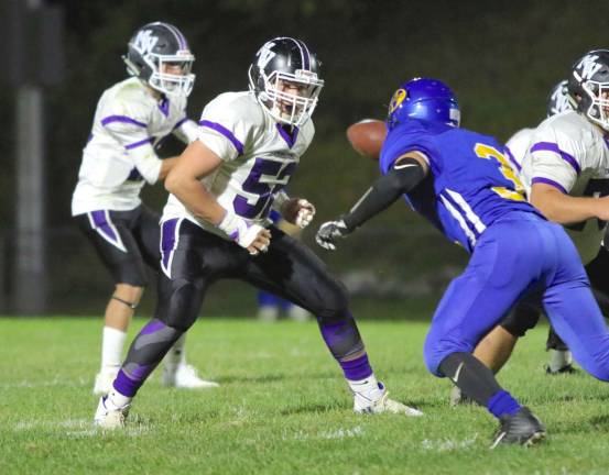 Jayden Prina (#52) and the strong play from the rest of the Crusaders' offensive line helped the team score 35 points.