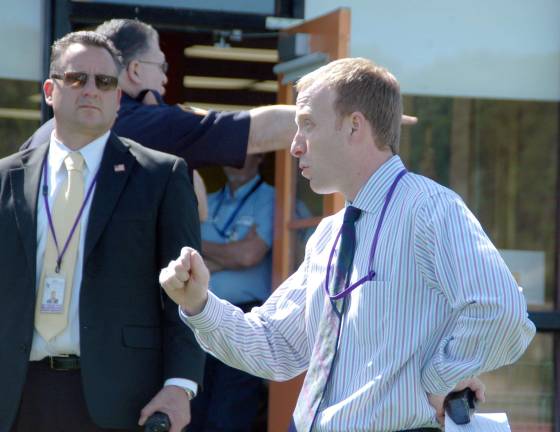 Central Valley Elementary School Principal, Dr. Eric Hassler, conducts a post-mortem following Tuesday's evacuation drill. Health/Safety Compliance Coordinator Frank Squillante is on the left.