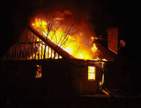 Photo by Douglas Peifer Orange County fire investigators and the State Police are investigating a fire that destroyed a 5,000-square foot home on Darra Court in Monroe late Saturday evening.