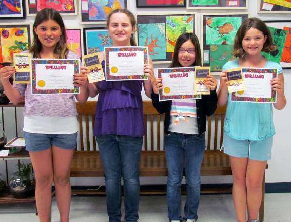The George G. Mason School Spelling Bee winners are, from left to right: Kaitlyn Brown (first), Madeline Gedvila (second), Katiana Arcuni (third) and Madison Spivak (fourth).