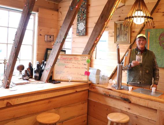 Photo by Roger Gavan Owner Peter Hull invites everyone to sample his authentic AppleJack this Saturday, Feb. 10, in the country bar in Apple Dave's old Red Barn at the new Distillery at Apple Dave's Orchards, 82 Four Corners Road.