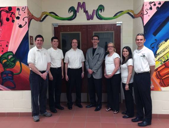 Monroe-Woodbury teachers and and alumni will be performing at the New York Wind Symphony&#xfe;&#xc4;&#xf4;s debut performance at Carnegie Hall on Monday, June 9. From left to right are: Frank Petrocelli, Peter Giorgio, Ryan Walther, Richard Regan, Lynn Brown, Lara Hansen and Christopher Taborsky.