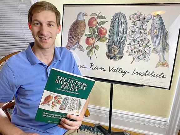 Alex Prizgintas holds the Spring 2022 edition of the Hudson River Valley Review, a peer-reviewed journal published by the Hudson River Valley Institute of Marist College, where his work has been published.