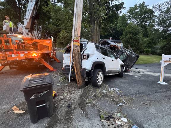 A 2018 Ford 150 left the roadway and crashed into a 2021 white Jeep in a driveway on Lakes Road in the Village of Monroe on June 27.