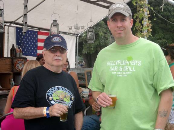 Nick Reynolds and Pat Donovan, both of Warwick, enjoying a sample at Pennings' Brew Fest.