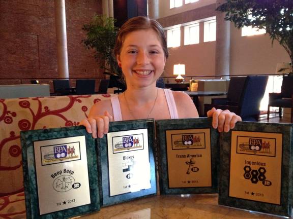 Tessa Lytle, an incoming seventh-grader at Monroe-Woodbury Middle School, won four first-place world titles at the tournament for the games &#xec;Blokus,&#xee; &#xec;Ingenious,&#xee; &#xec;Trans America&#xee; and &#xec;Beep Beep.&#xee;