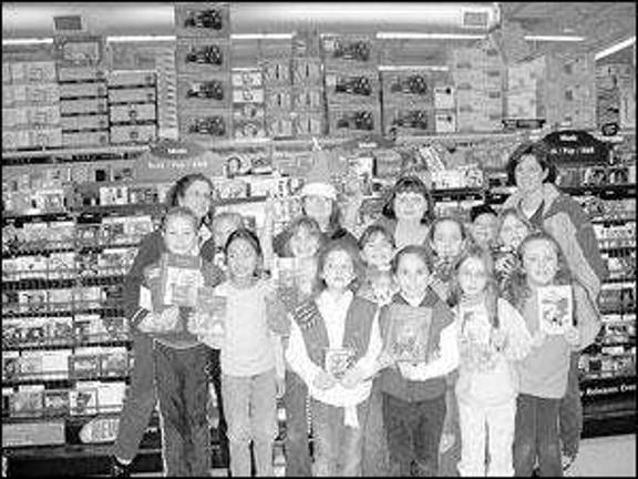 Brownies earn money to buy gifts for family