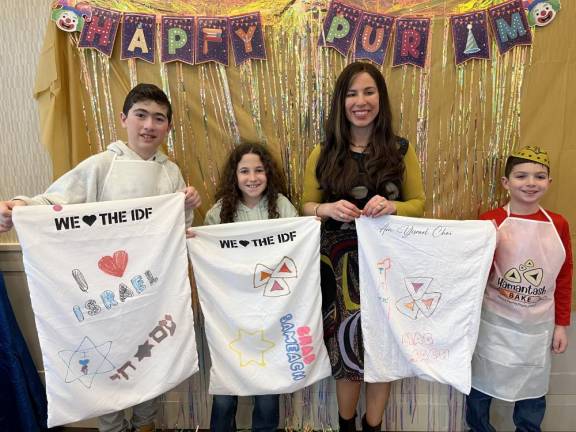 Families bake Hamantashin in preparation for Purim holiday