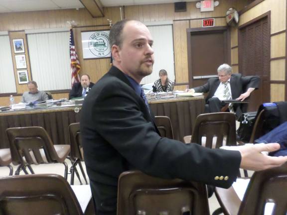 Steve Gagnon, a senior engineer with the Orange County Department of Health, speaks to residents about their concerns with the water at the Harriman Village Hall. Behind him are members of the Harriman Village Board.