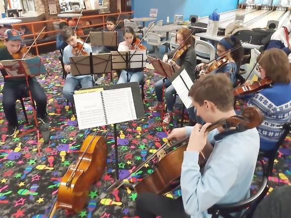 Allegro Students playing at Chabad’s Hanukkah Celebration at Colonial Lanes in Chester on Dec. 23.