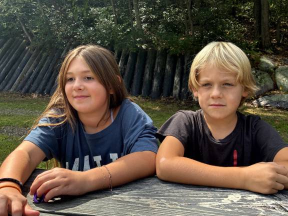 Talula and Zachary Mills, 10 and 8, take a few minutes from their school day to talk to this reporter about Roots &amp; WIngs, which is run by their parents. “It’s way more outside,” said Zach, compared to public school.