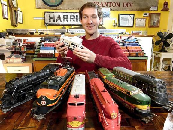 Woodbury Historical Society President Alex Prizgintas displays some vintage model trains.