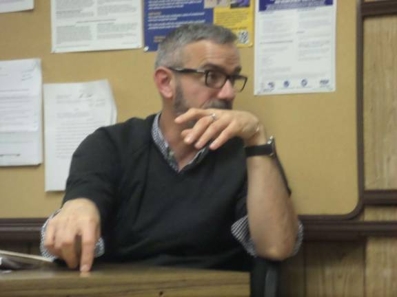 Photos by Nathan Mayberg Hydrogeologist Thomas Cusack, a consultant to the Village of Harriman on its water issues, discusses recent health code violations in the drinking water on Tuesday with the public.
