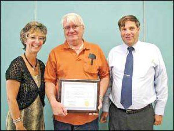 Goshen schools honors retired custodians for years of service
