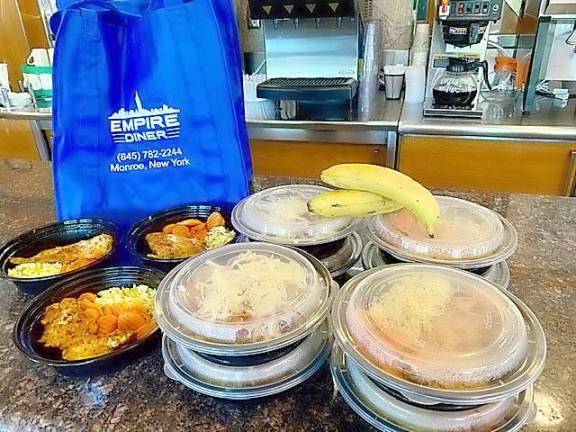The Empire Diner in Monroe creates and produces the meals, which are packaged and delivered to families each week by a dedicated team of volunteers.