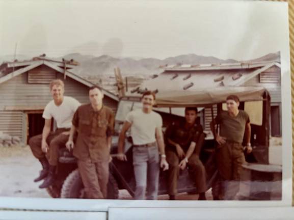Patrick Shea with fellow soldiers in-country (Photo provided)