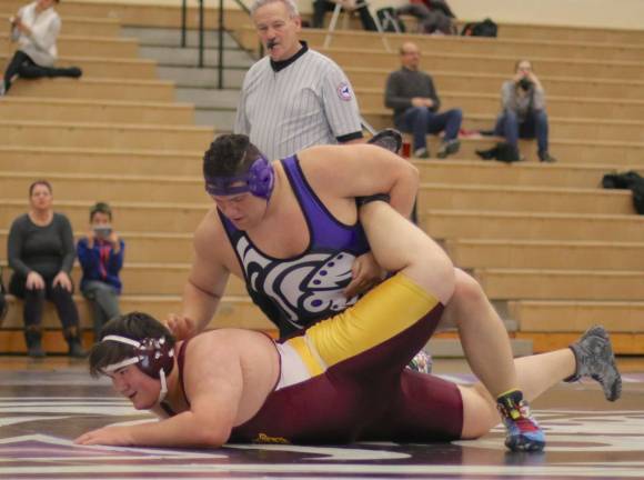 Preston Havison (285 lbs.) turns his opponent before pinning him at 3:52 in the match.
