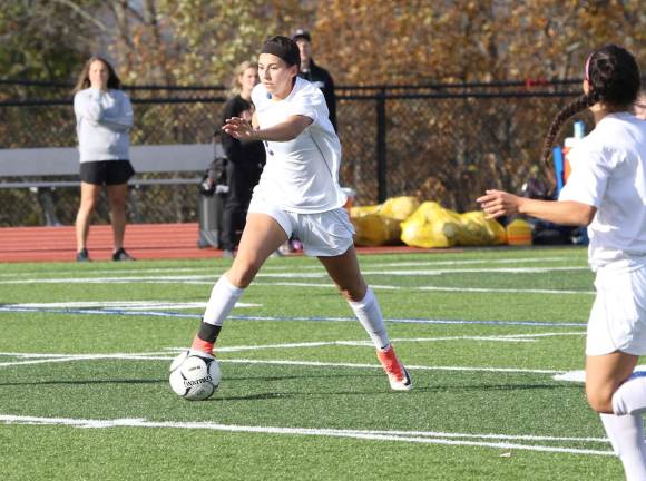 Photos by William Dimmit Kaitlyn Hogan dominated play at midfield for the Crusaders.