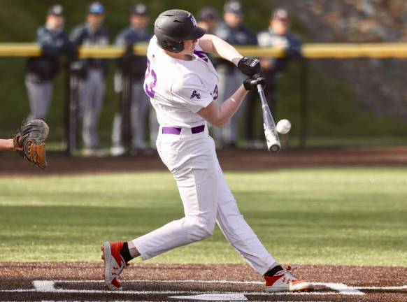 Kyle McDermott hits one of his two doubles in the game.