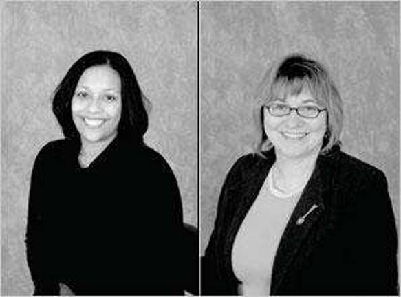 Two insurance agents further their education