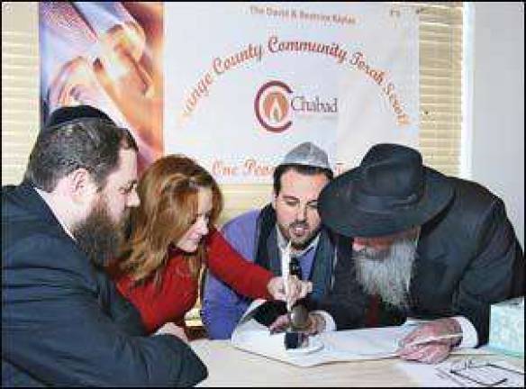 Chabad of Orange County celebrates opening of new center with Torah-writing ceremony