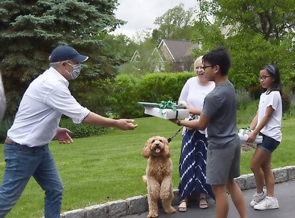 Tuxedo Park administrators board the ‘Happy Bus’