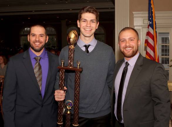 Jack Dembia receives the Rookie of the Year Award from Head Coach Ryan Baldock and Assistant Coach Mike Gennaro.
