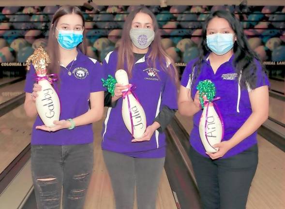 Three of the seniors on this year’s Bowling Team: Gabby Krummack, Julia Viera and Ana Valle. Photos by William Dimmit.