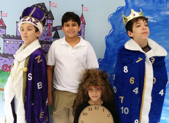 Anthony Melo left, as &quot;&#xeb;King AZAZ,&quot; Justin Polanco as &quot;Milo,&quot; Christopher Pezzella as &quot;Tock&quot; the watch dog, and Paul Bochterle as the &quot;Mathemagician&quot; are cast members of the North Main Drama Club&#xed;s production of &quot;The Phantom Tollbooth Jr.&quot;