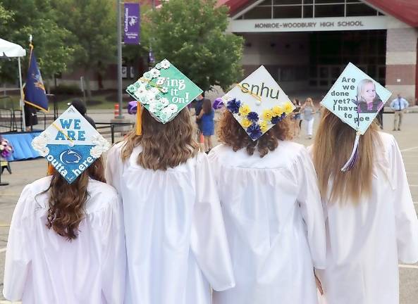 Monroe-Woodbury Class of 2020 graduates Catarina Schiff, Lexi Berges, Megan Petko and Quinn Guyt at graduation services on Monday, June 22. Photo by Joe Guyt.