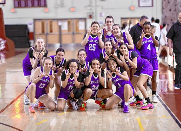 The Crusaders celebrate an important league victory in Kingston on Saturday.