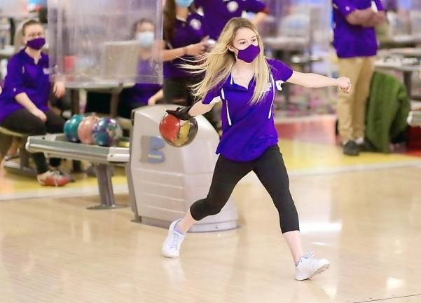Senior Samantha Larkin looks for a spare in first game.