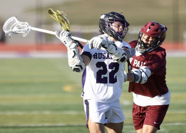 Anthony Severo (#22) gets off a shot.