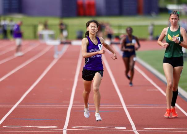 Kaylee Chang, #1, ran away from the pack as she won the Steeplechase.