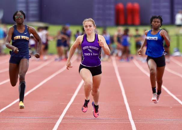 Olivia Heim took first in the 3,000 meter race with a time of 10:33.15.