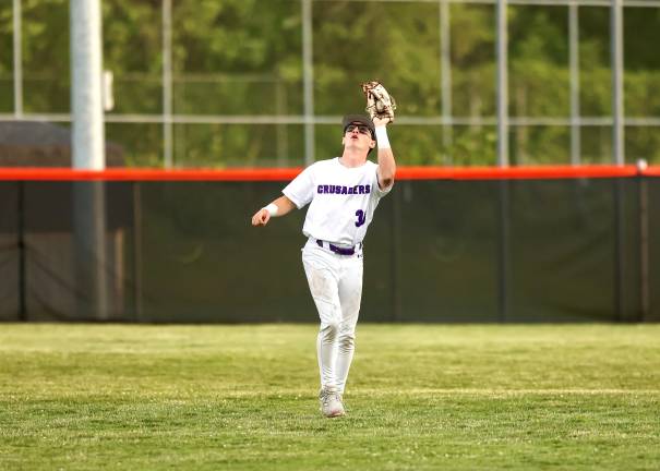 Crusader, Connor McHale makes a catch in right field.