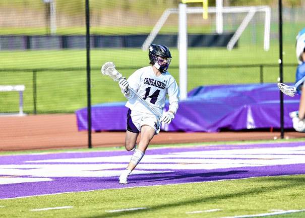 Carson Pesce, #14, had two goals and four assists during the game.