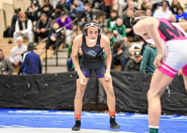 Crusader Elijah Brown gets ready for his 138-lb. championship match to start.
