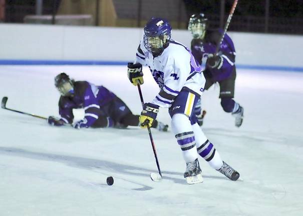 Sophomore Brendan Murphy leads an attack against the Purple team.