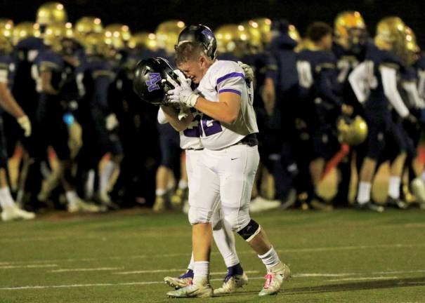 It hurts: Crusader Jayden Prina walks off the field after the Crusaders' season and his high school career come to an end.