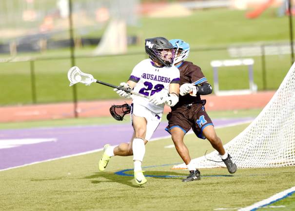 #22 ,Anthony Severo scored three goals against the Middies.