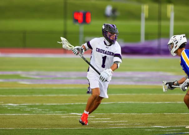 #1, Gavin Fitzgibbon attacks the Wizards defense.